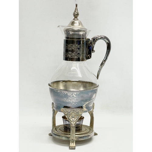 463 - A silver plated coffee carafe. 39.5cm