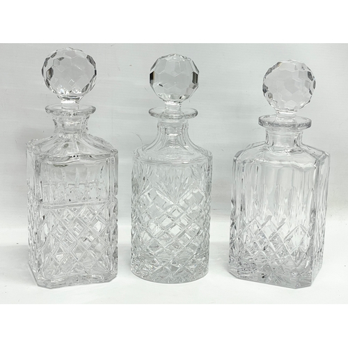 465 - 4 crystal decanters.