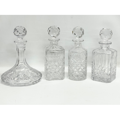 465 - 4 crystal decanters.