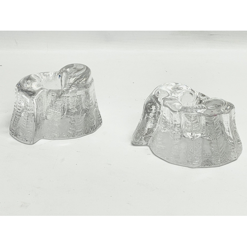 469 - A pair of Kosta Boda crystal candleholders. 9.5x6cm.