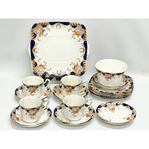 661 - A vintage 18 piece Heathcote China tea set.