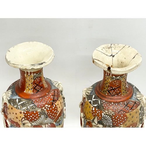 662 - A pair of late 19th century Japanese Satsuma vases. 32cm