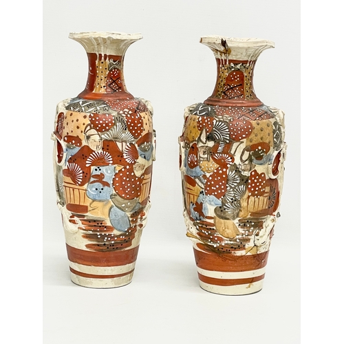 662 - A pair of late 19th century Japanese Satsuma vases. 32cm