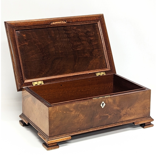 129 - An Edwardian mahogany jewellery box. 32x19x14cm