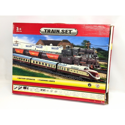 238 - A Train Set, Rail Series by Telitoy including trains, carriages and tracks.