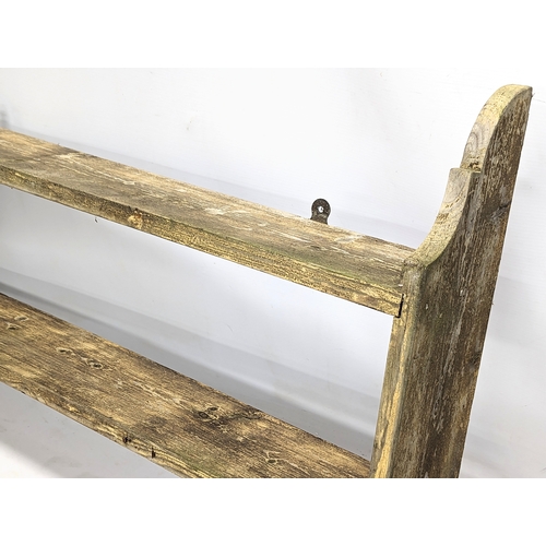 381 - A late 19th century pine wall bracket. 92x56cm