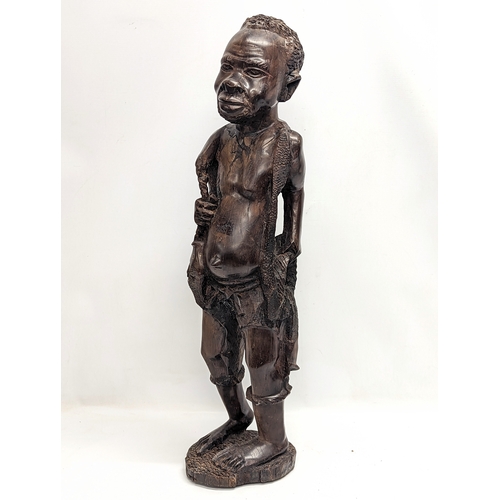 471 - A large early 20th century African figure, circa 1900-1910. 76cm