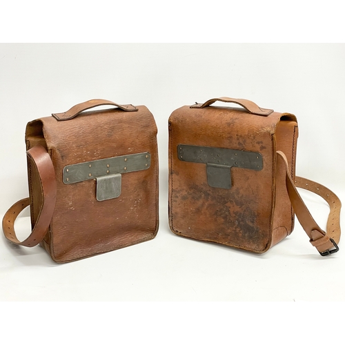 318 - 2 1940’s WW2 leather saddle bags. 25x32cm.