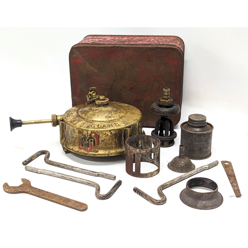 385 - A vintage brass Primus stove and parts.