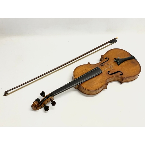 320 - A good quality late 19th/early 20th century violin in case. Case measures 79cm