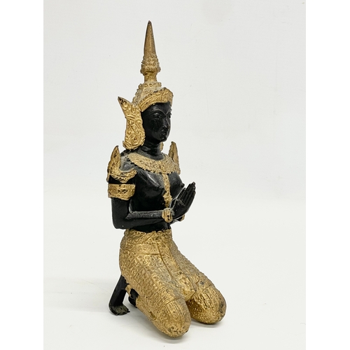 409 - An early 20th century gilt bronze Deity figure. 22cm