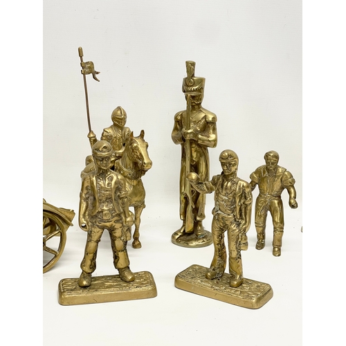 473 - A quantity of large heavy brass ornaments. Horse and cart measures 33cm. Knight on horse measures 21... 