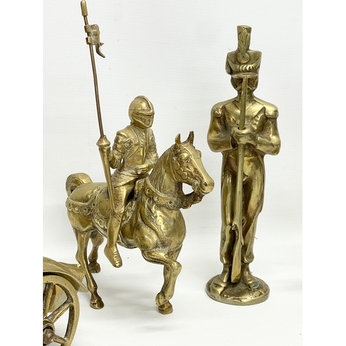 473 - A quantity of large heavy brass ornaments. Horse and cart measures 33cm. Knight on horse measures 21... 