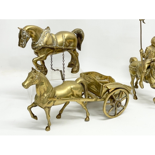 473 - A quantity of large heavy brass ornaments. Horse and cart measures 33cm. Knight on horse measures 21... 