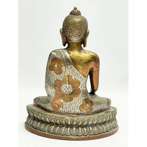 474 - An early 20th century copper and brass Deity figure. 16x20cm.