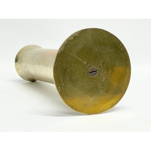 386 - A brass cannon shell. 10x22cm