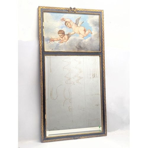 425 - A large vintage ornate gilt framed mirror with hand painted panel. 69.5x134cm