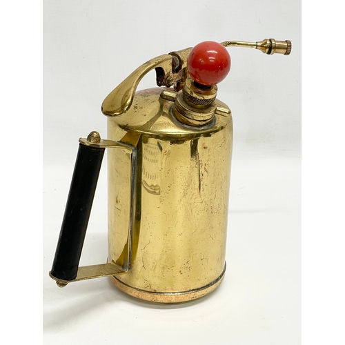 387 - A large vintage brass burner. 27x22cm.