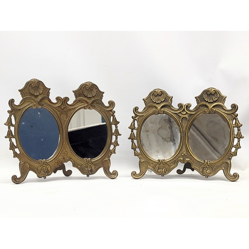 484 - A pair of ornate brass mirrors. 21x19.5cm