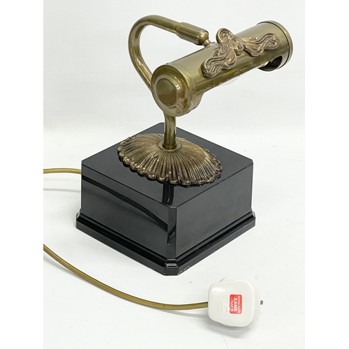 437 - An ornate brass desk lamp. 15x15x26cm