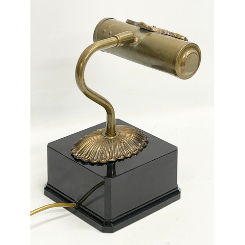 437 - An ornate brass desk lamp. 15x15x26cm