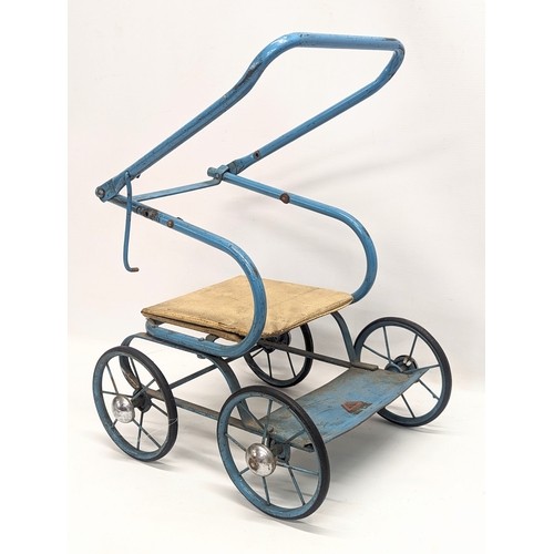 250 - A vintage Tri-Ang dolls pram.