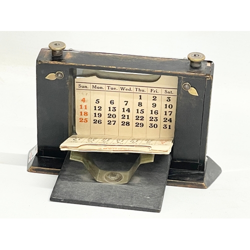 576 - An Art Deco silver desktop calendar. 15x10cm