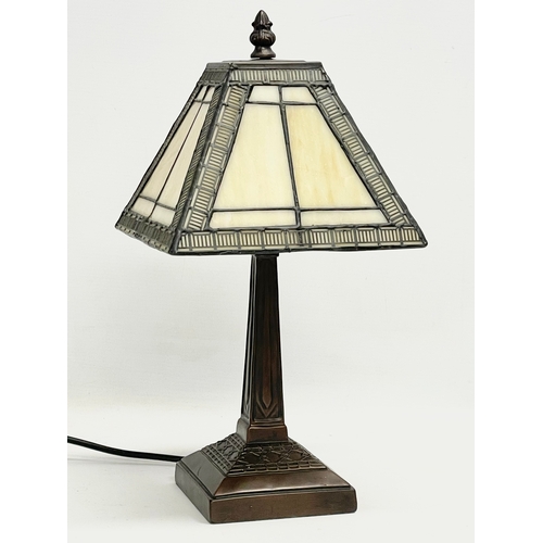 492 - A Tiffany style table lamp. 38cm