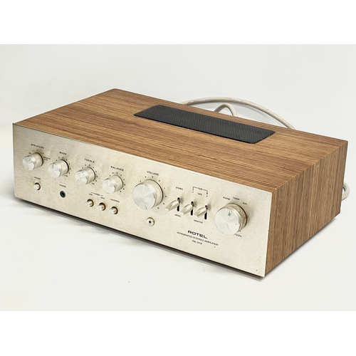 251 - A vintage Rotel RA-312 Integrated Stereo Amplifier. 40x24x11cm