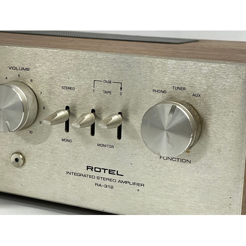 251 - A vintage Rotel RA-312 Integrated Stereo Amplifier. 40x24x11cm