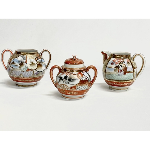 497 - 3 pieces of late 19th/early 20th century Japanese Kutani porcelain. Milk jug and sugar bowls.