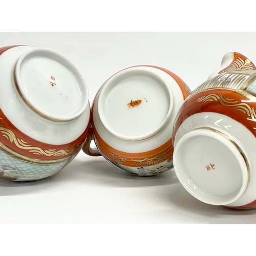 497 - 3 pieces of late 19th/early 20th century Japanese Kutani porcelain. Milk jug and sugar bowls.