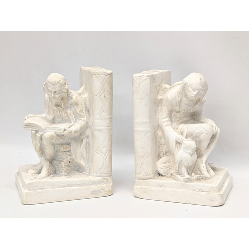 645 - A pair of vintage bookends. 14x19.5cm