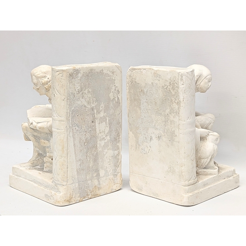 645 - A pair of vintage bookends. 14x19.5cm