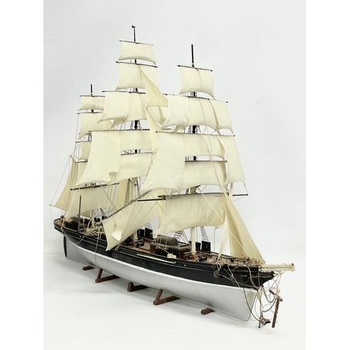 254 - A large vintage plastic model ship. 74x57cm