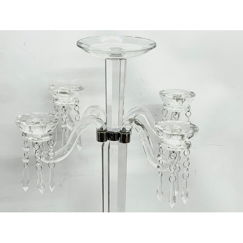 435 - A pair of large ornate glass candelabrums. 33x78.5cm