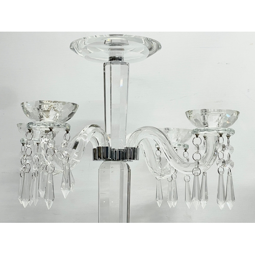 435 - A pair of large ornate glass candelabrums. 33x78.5cm