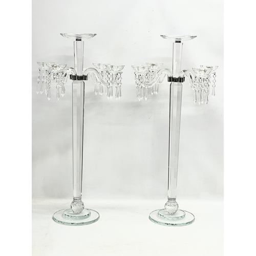 435 - A pair of large ornate glass candelabrums. 33x78.5cm