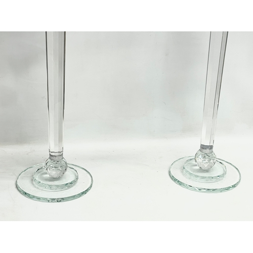 435 - A pair of large ornate glass candelabrums. 33x78.5cm