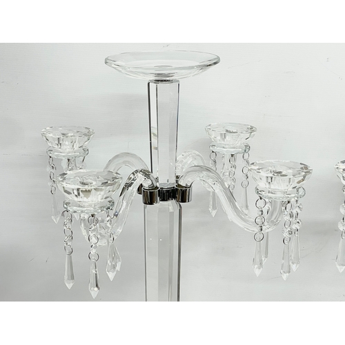 435 - A pair of large ornate glass candelabrums. 33x78.5cm