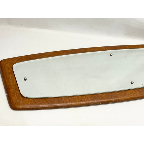 260B - A long Mid Century teak framed mirror. 122x40.5cm