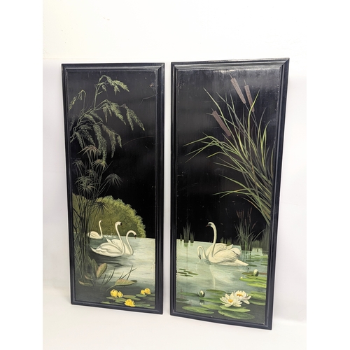 503 - A pair of early 20th century hand painted lacquered wall plaques. 40x99cm