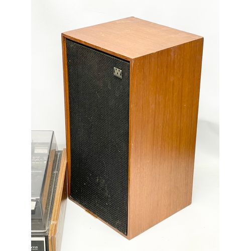 257 - A vintage Sanyo G2711-Super music record cassette player with a pair of teak Wharfedale speakers.