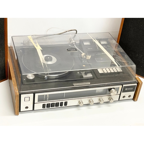 257 - A vintage Sanyo G2711-Super music record cassette player with a pair of teak Wharfedale speakers.