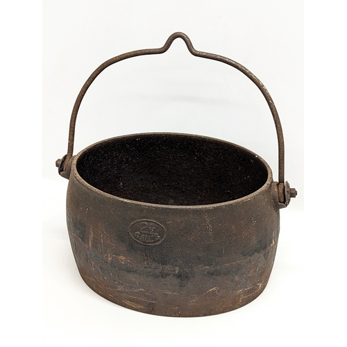 687 - A Victorian cast iron pot. 37x38cm