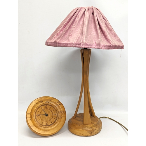 611 - A vintage Irish Beech table lamp by Austin Wood Design with wall clock.