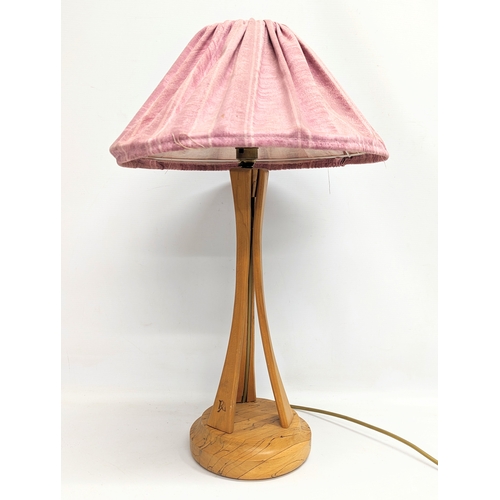 611 - A vintage Irish Beech table lamp by Austin Wood Design with wall clock.