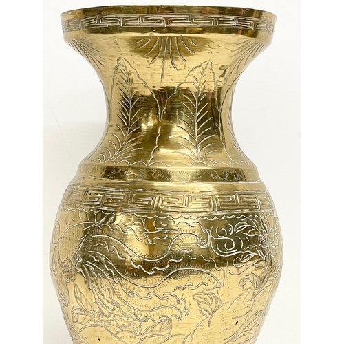 517 - A late 19th century Chinese brass vase. 35cm