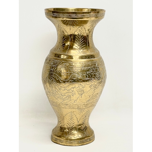 517 - A late 19th century Chinese brass vase. 35cm