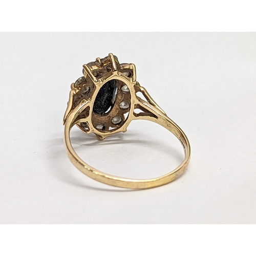 580 - A 9ct gold ring. 3.64g. Size UK T.